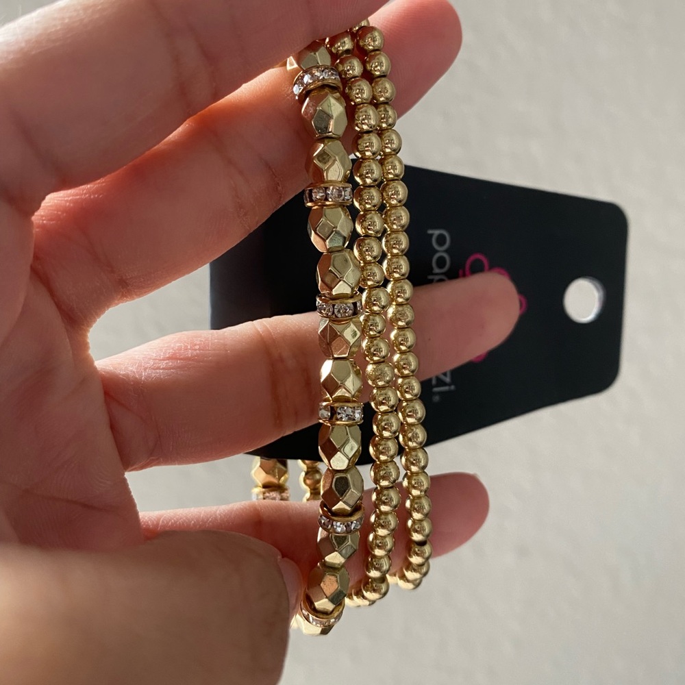 3 individual gold bracelets